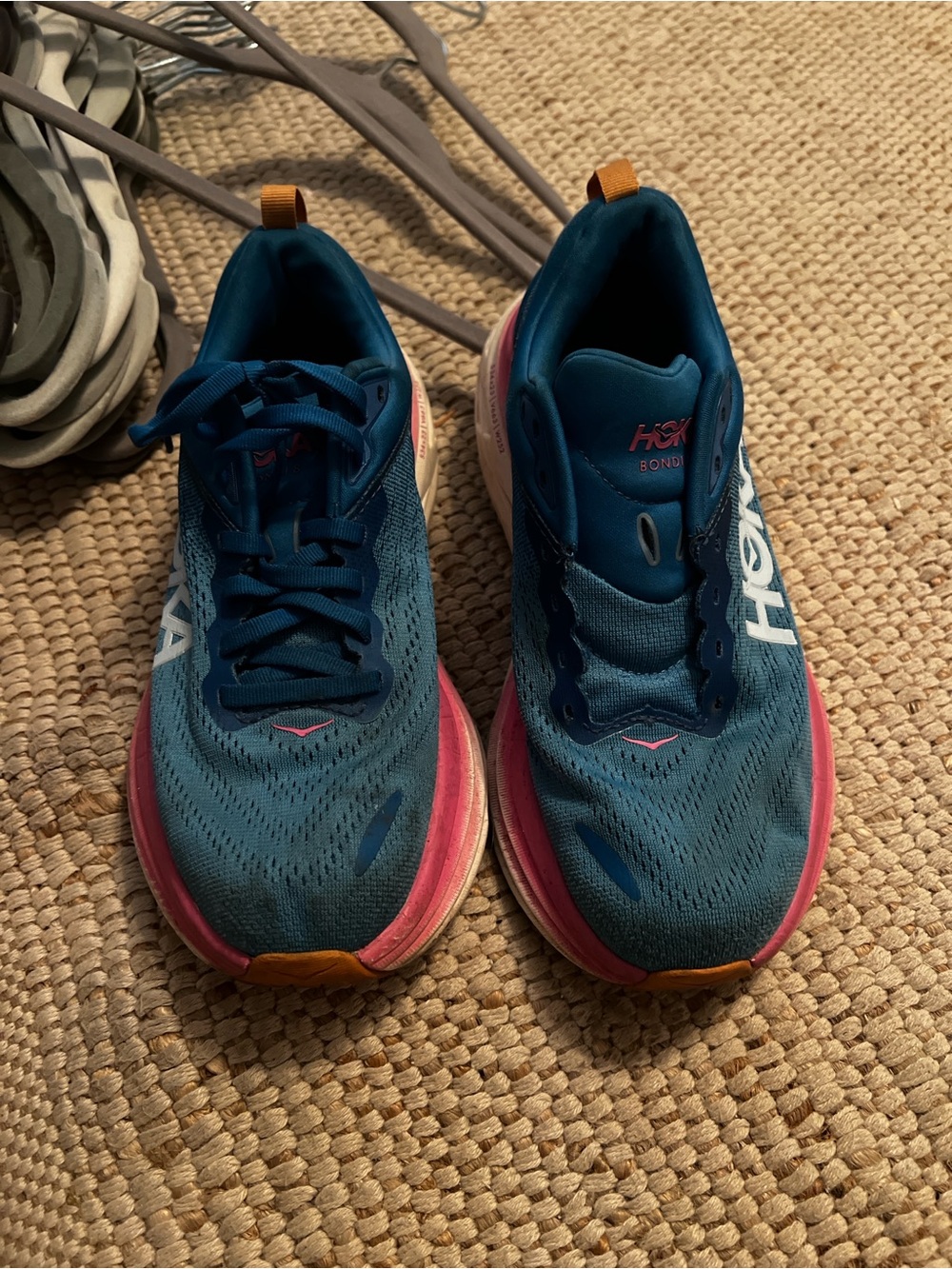 Hoka Teal and Pink Running Shoes with Orange Pull Tabs
